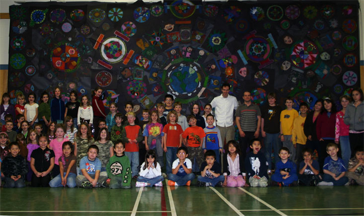 300 elementary students made mandalas with me on paper. We put them up in the gym as one big mandala