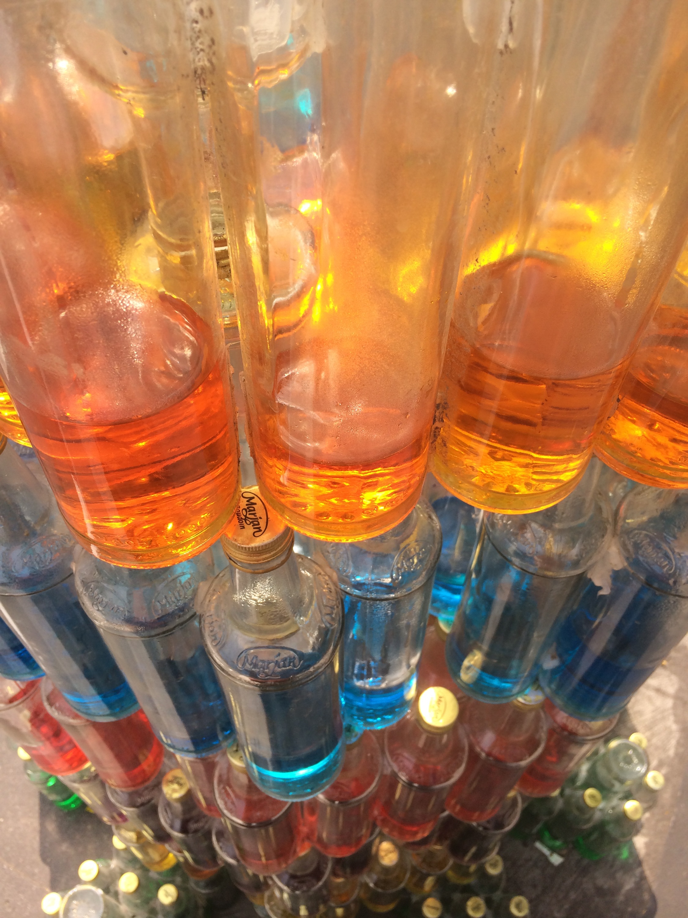 Glass bottle MD modules, tower of color, in the middle of the street